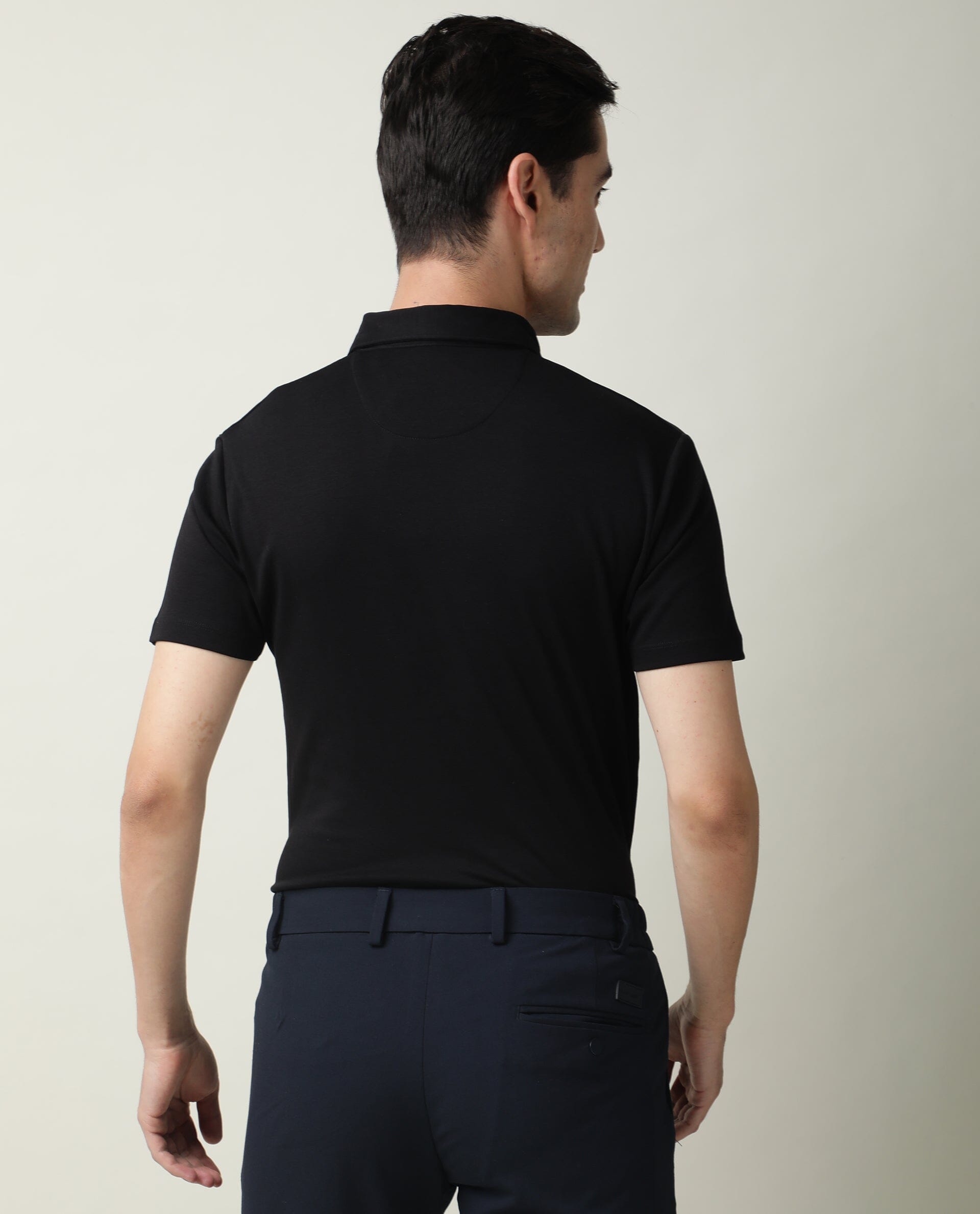 Rare Rabbit Men's Badge Black Cotton Fabric Collared Neck Half Sleeves Polo T-Shirt