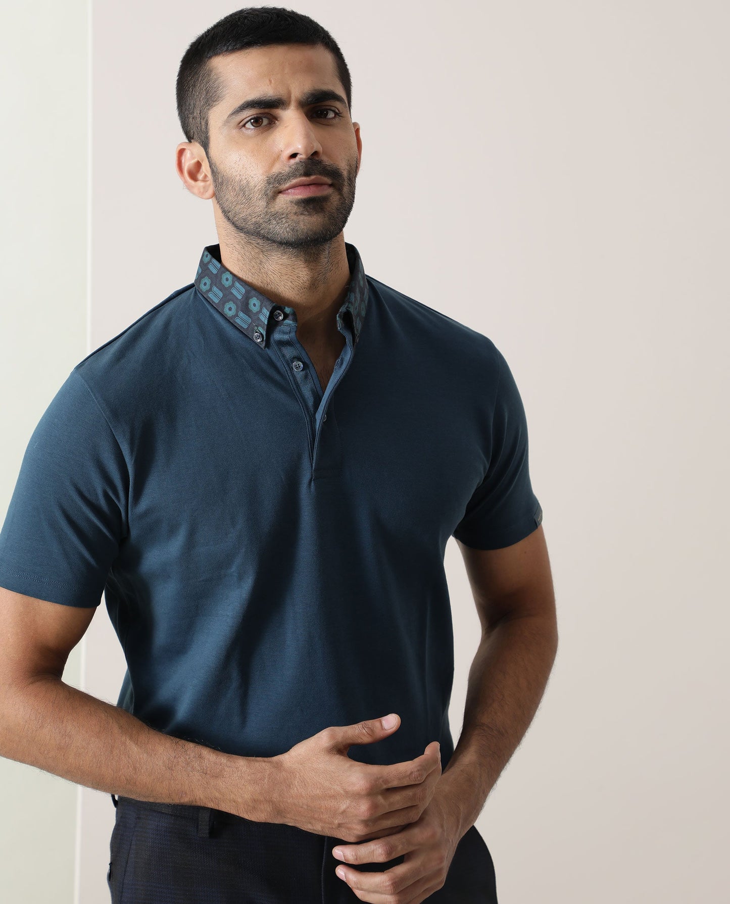 Rare Rabbit Men's Ringers Petrol Cotton Fabric Printed Collar Neck Half Sleeves Polo T-Shirt