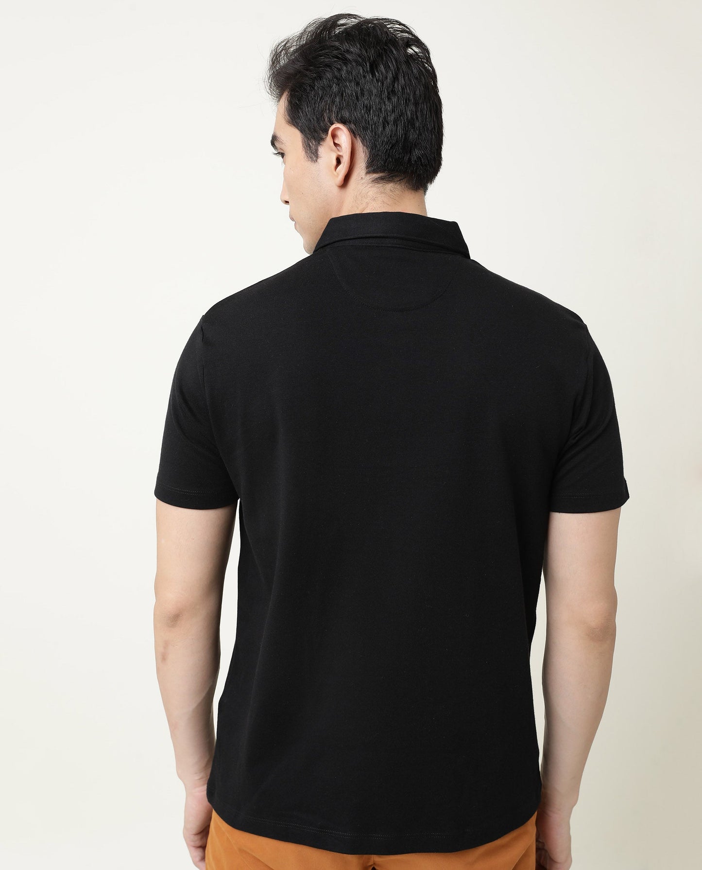 Rare Rabbit Men's Crown P Black Solid Cotton Fabric Collared Neck Chest Crown Badge Half Sleeve Polo T-Shirt