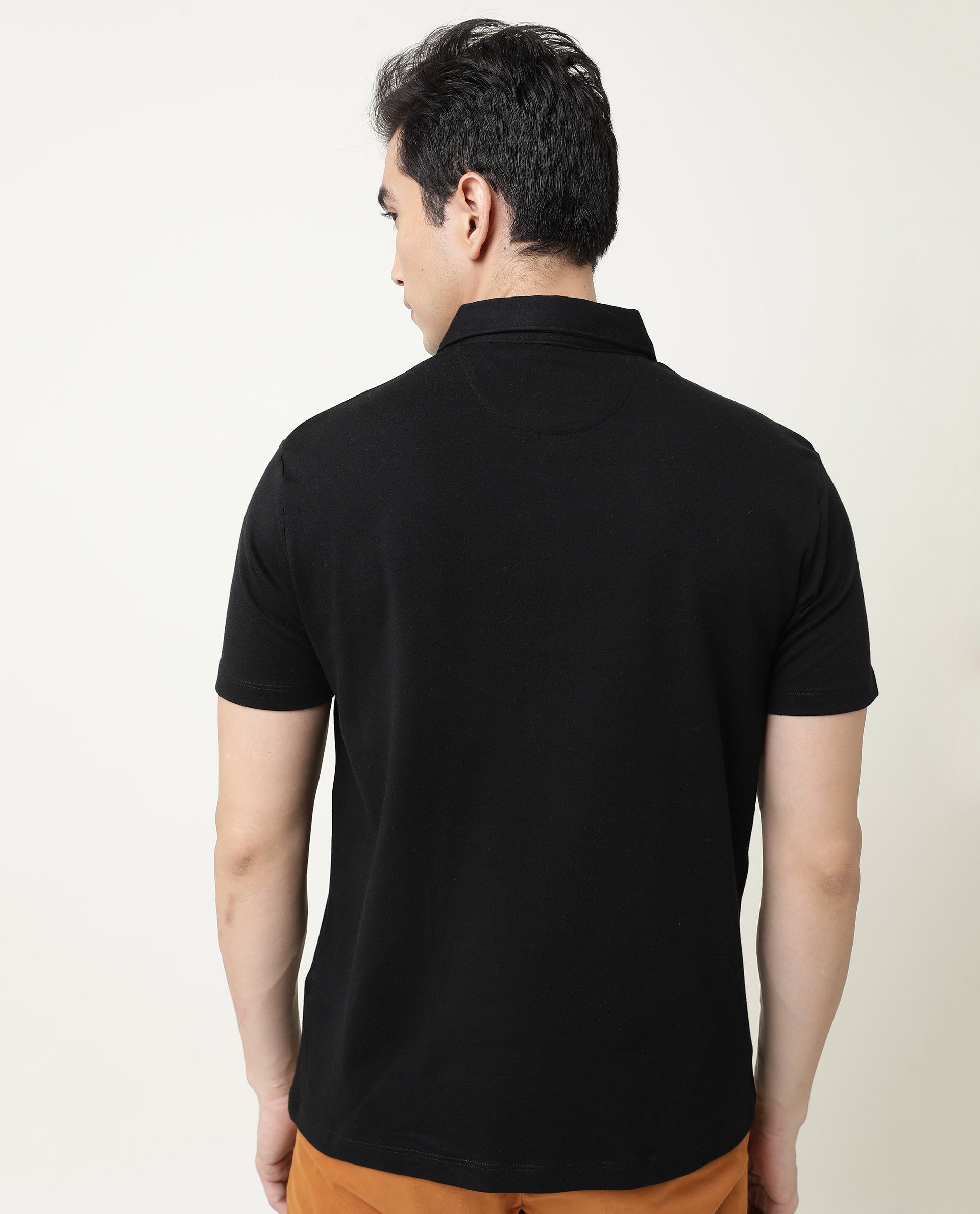 Rare Rabbit Men's Crown P Black Solid Cotton Fabric Collared Neck Chest Crown Badge Half Sleeve Polo T-Shirt