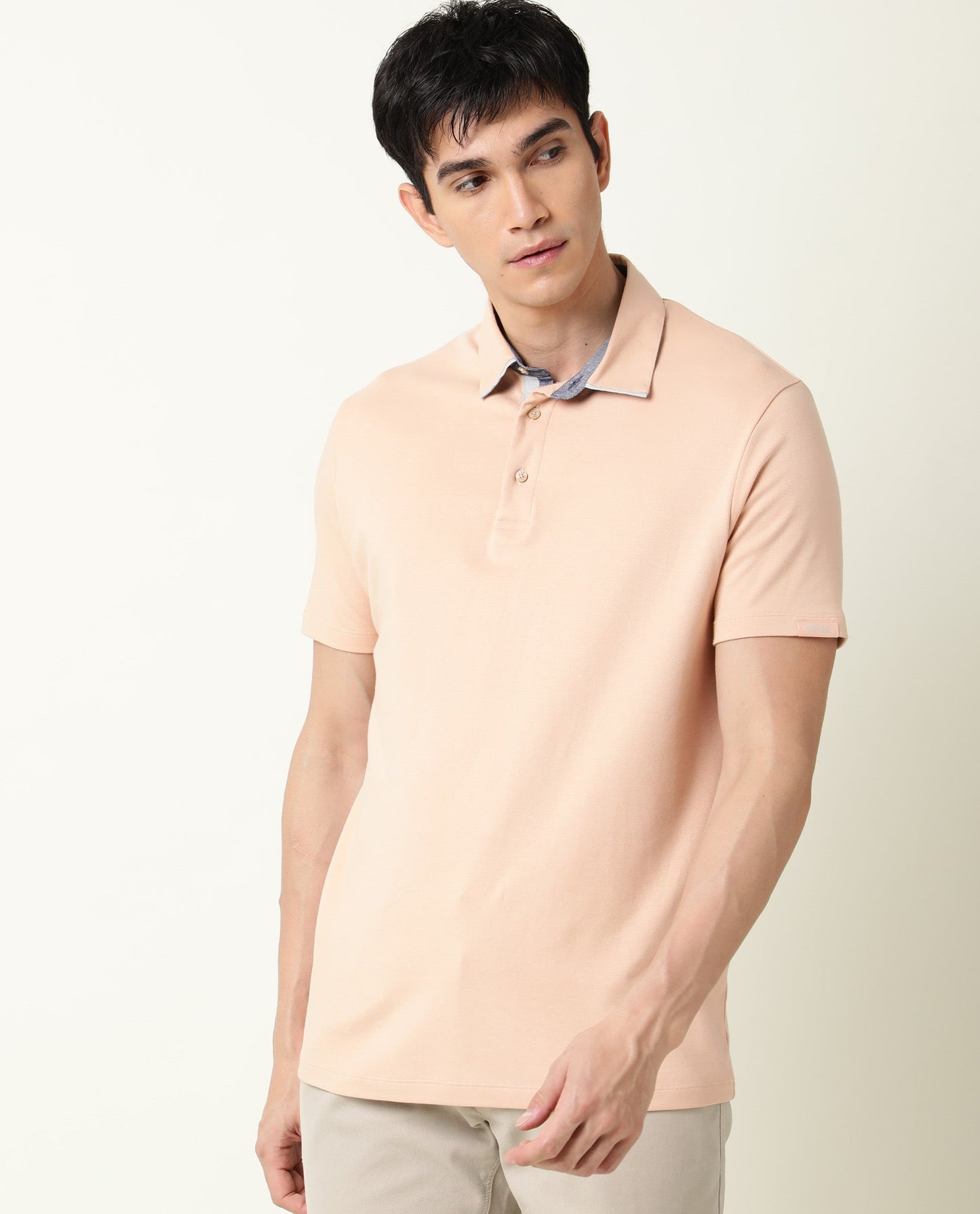 Rare Rabbit Men's Zap Peach Solid Cotton Fabric Collared Neck Half Sleeve Polo T-Shirt