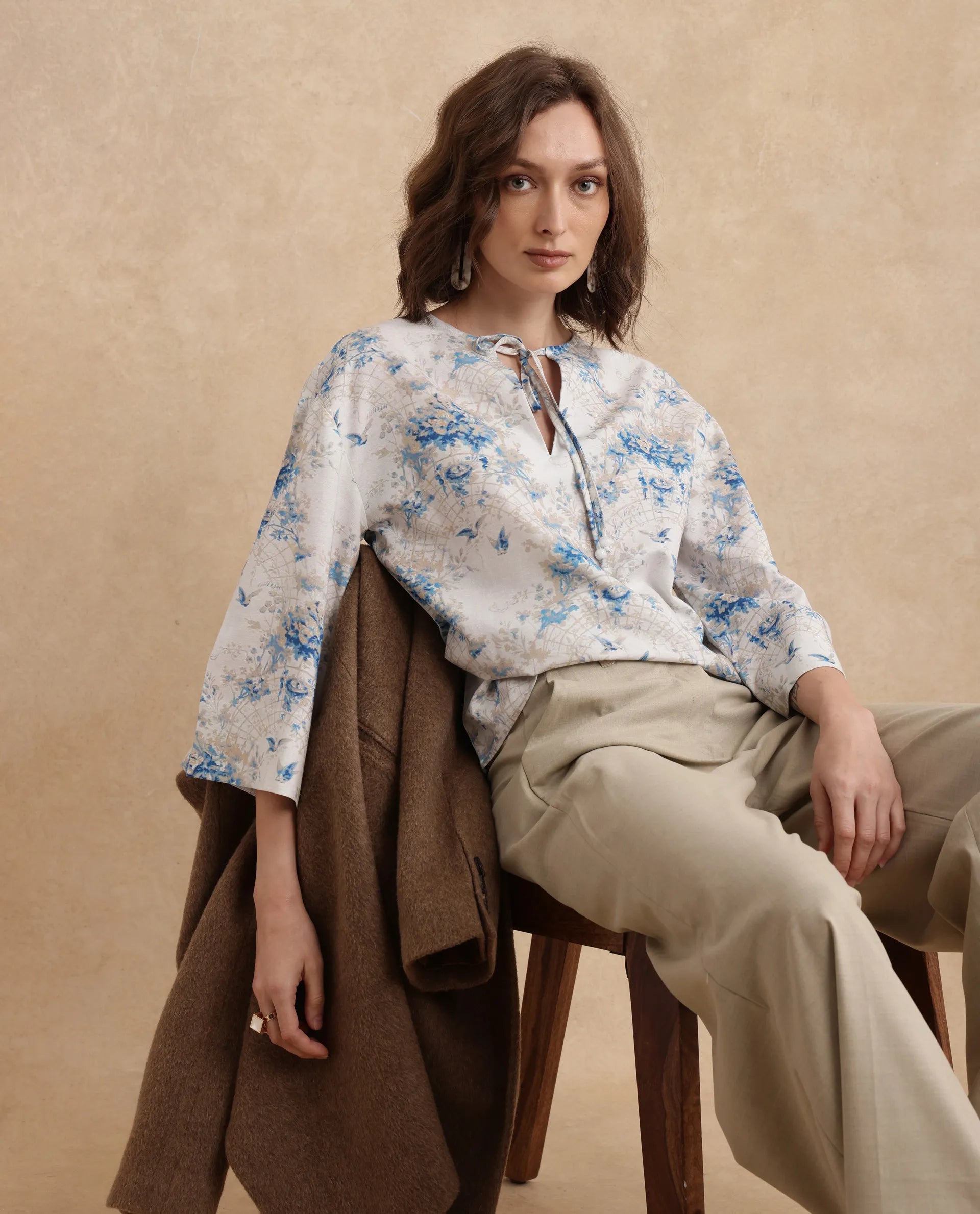 Rareism Women Wemiso Dusky Blue Bell Seeves Tie Up Neck Regular Fit Floral Print Top