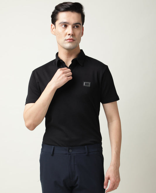 Rare Rabbit Men's Badge Black Cotton Fabric Collared Neck Half Sleeves Polo T-Shirt