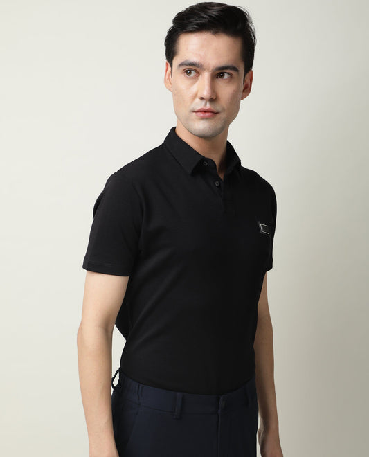Rare Rabbit Men's Badge Black Cotton Fabric Collared Neck Half Sleeves Polo T-Shirt