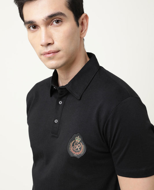 Rare Rabbit Men's Crown P Black Solid Cotton Fabric Collared Neck Chest Crown Badge Half Sleeve Polo T-Shirt