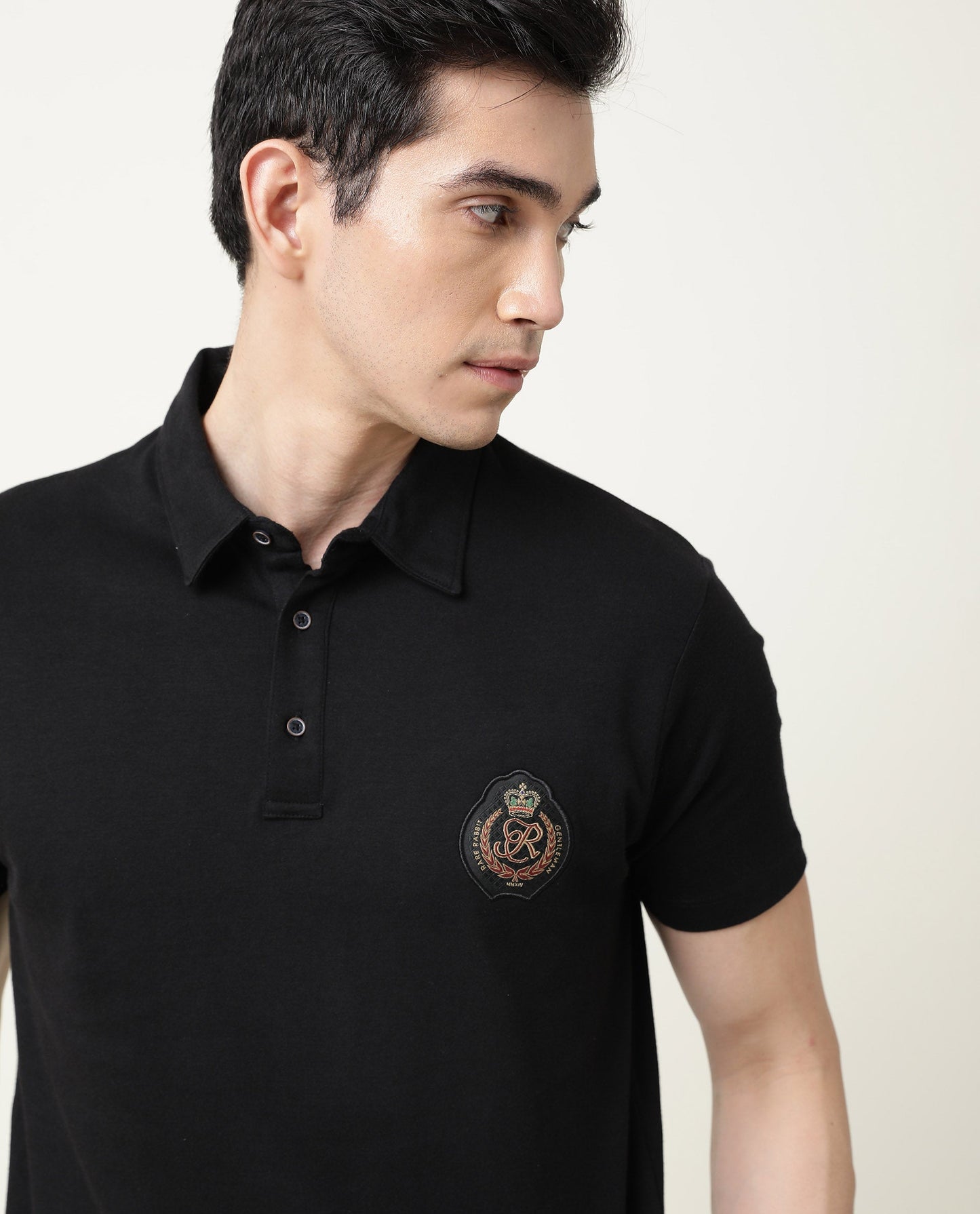 Rare Rabbit Men's Crown P Black Solid Cotton Fabric Collared Neck Chest Crown Badge Half Sleeve Polo T-Shirt