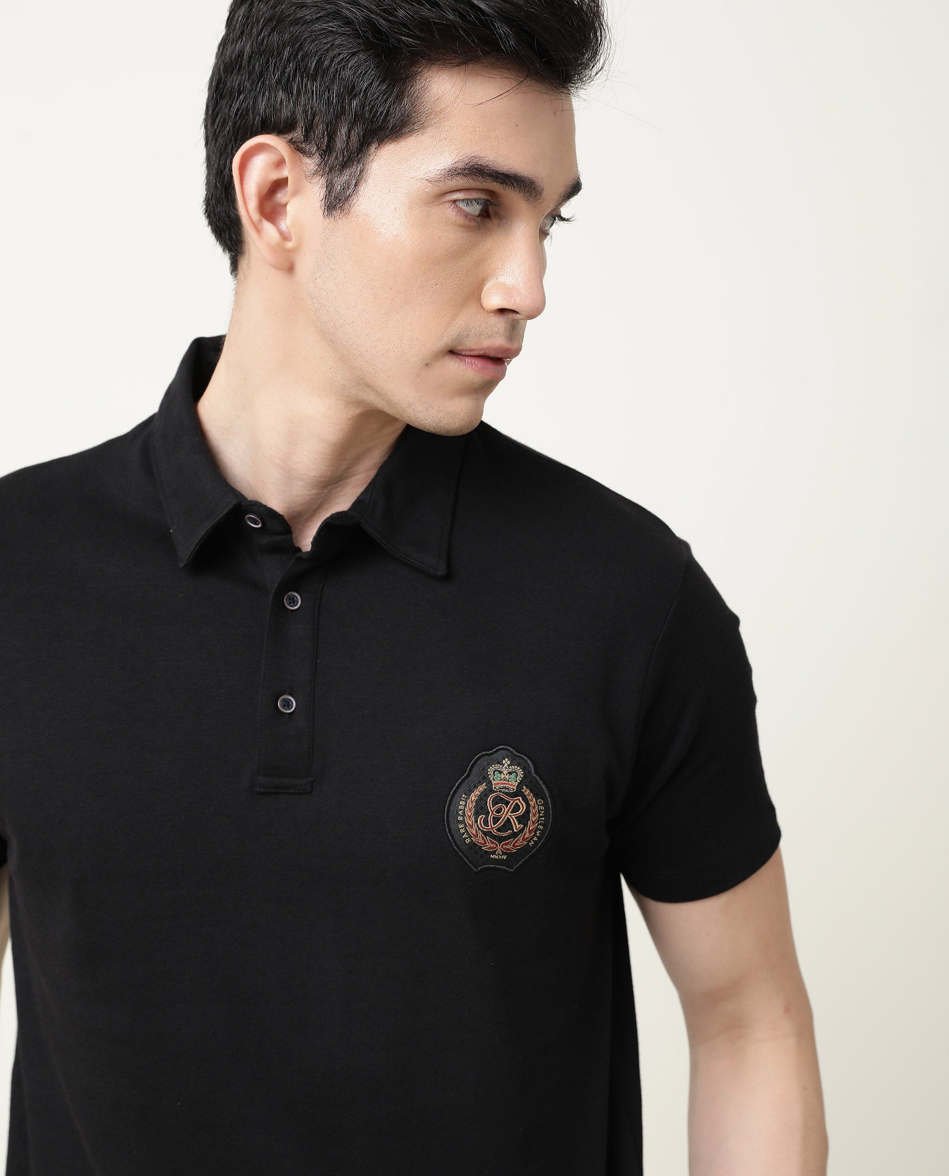 Rare Rabbit Men's Crown P Black Solid Cotton Fabric Collared Neck Chest Crown Badge Half Sleeve Polo T-Shirt