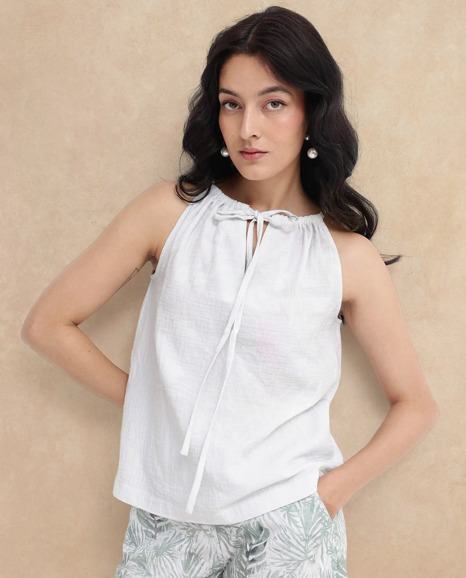 Rareism Women Oliya Off White Cotton Sleeveless Halter Neck Tropical Print Top