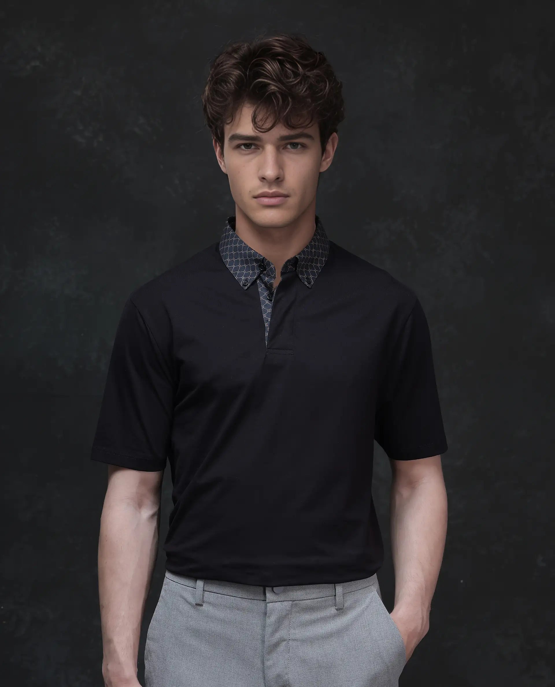 Rare Rabbit Men's Rinz Black Cotton Blend Fabric Half Sleeve Spread Collar Regular Fit Plain Polo