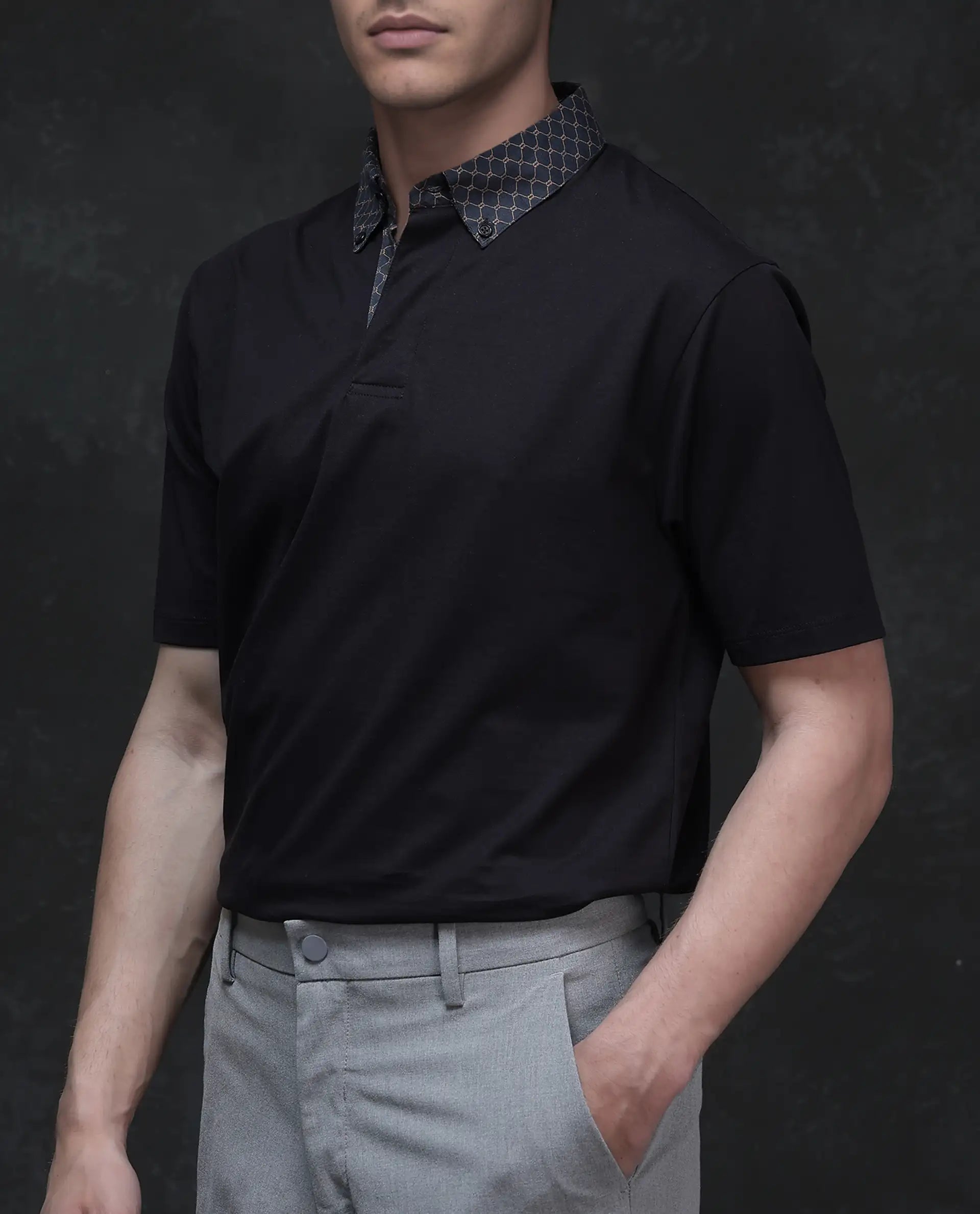 Rare Rabbit Men's Rinz Black Cotton Blend Fabric Half Sleeve Spread Collar Regular Fit Plain Polo