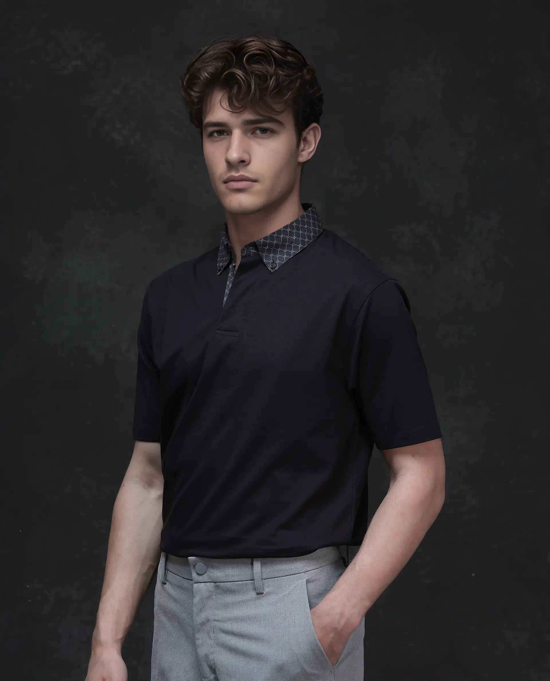 Rare Rabbit Men's Rinz Black Cotton Blend Fabric Half Sleeve Spread Collar Regular Fit Plain Polo