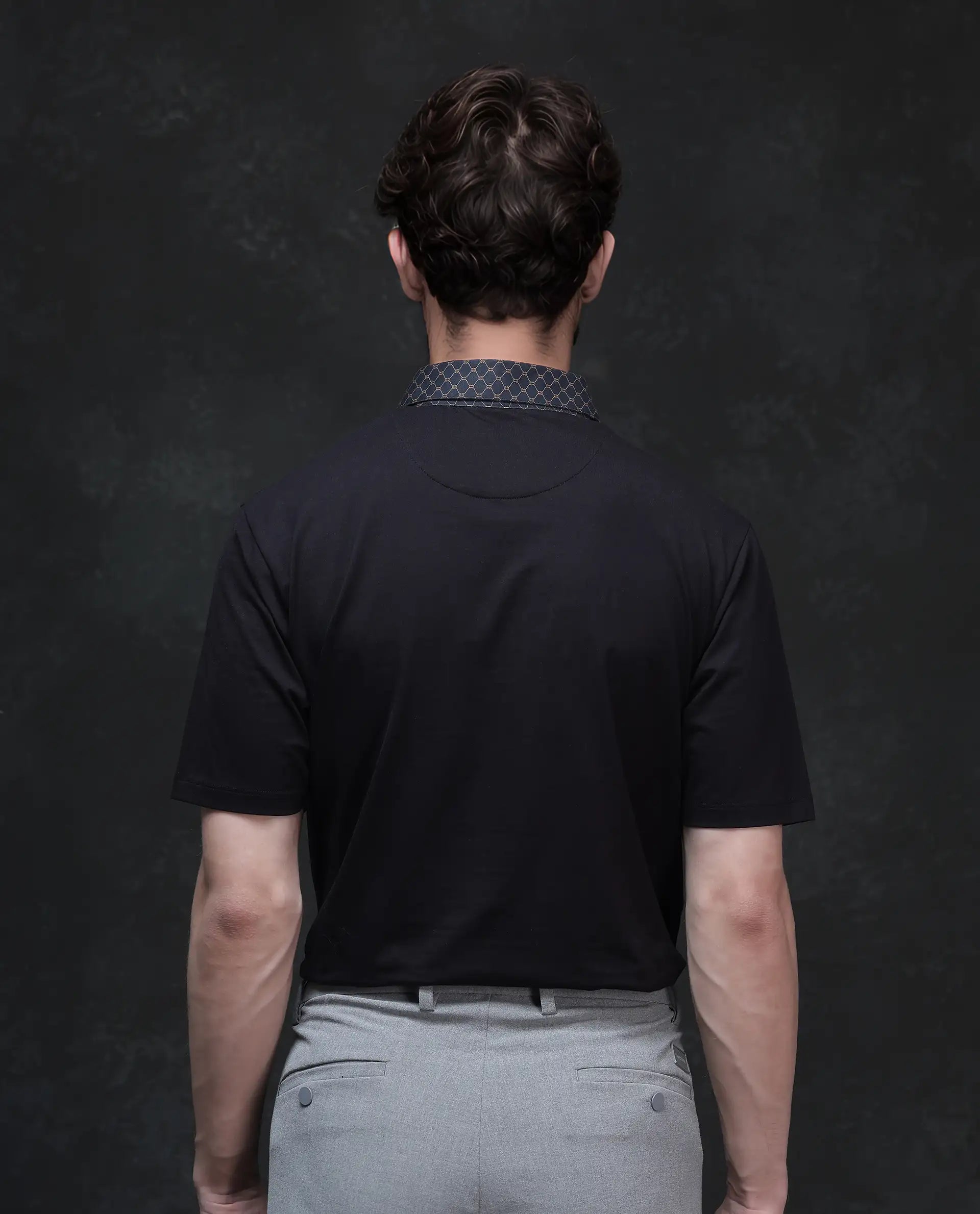 Rare Rabbit Men's Rinz Black Cotton Blend Fabric Half Sleeve Spread Collar Regular Fit Plain Polo