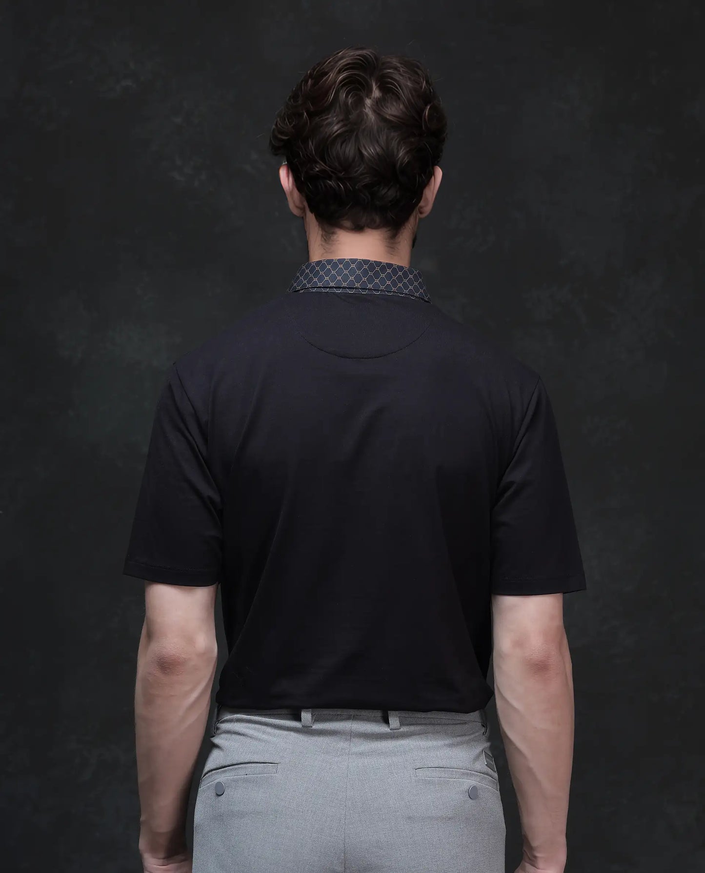 Rare Rabbit Men's Rinz Black Cotton Blend Fabric Half Sleeve Spread Collar Regular Fit Plain Polo