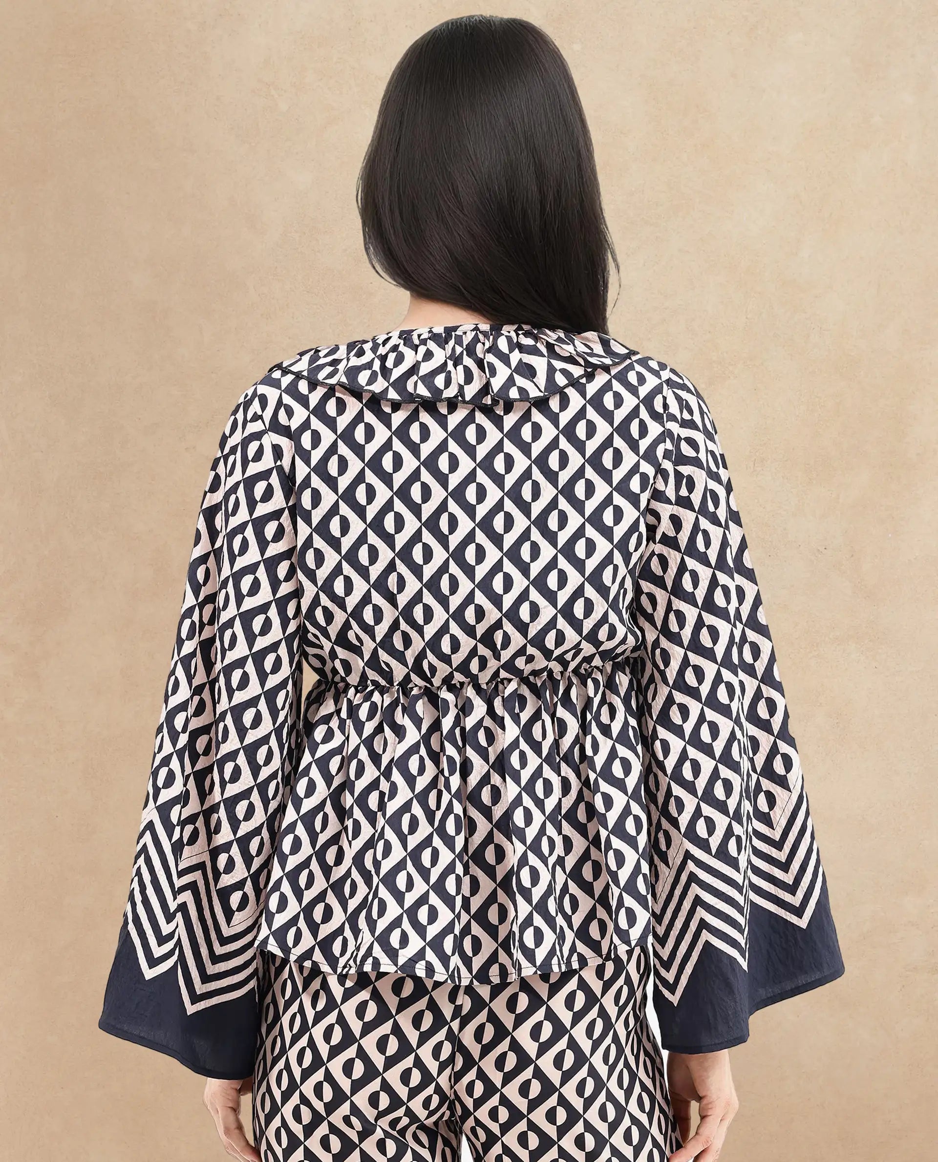 Rareism Women Smor Black Viscose Fabric Bell Sleeves Ruffled Neck Tie Up Closure Geometric Print Top