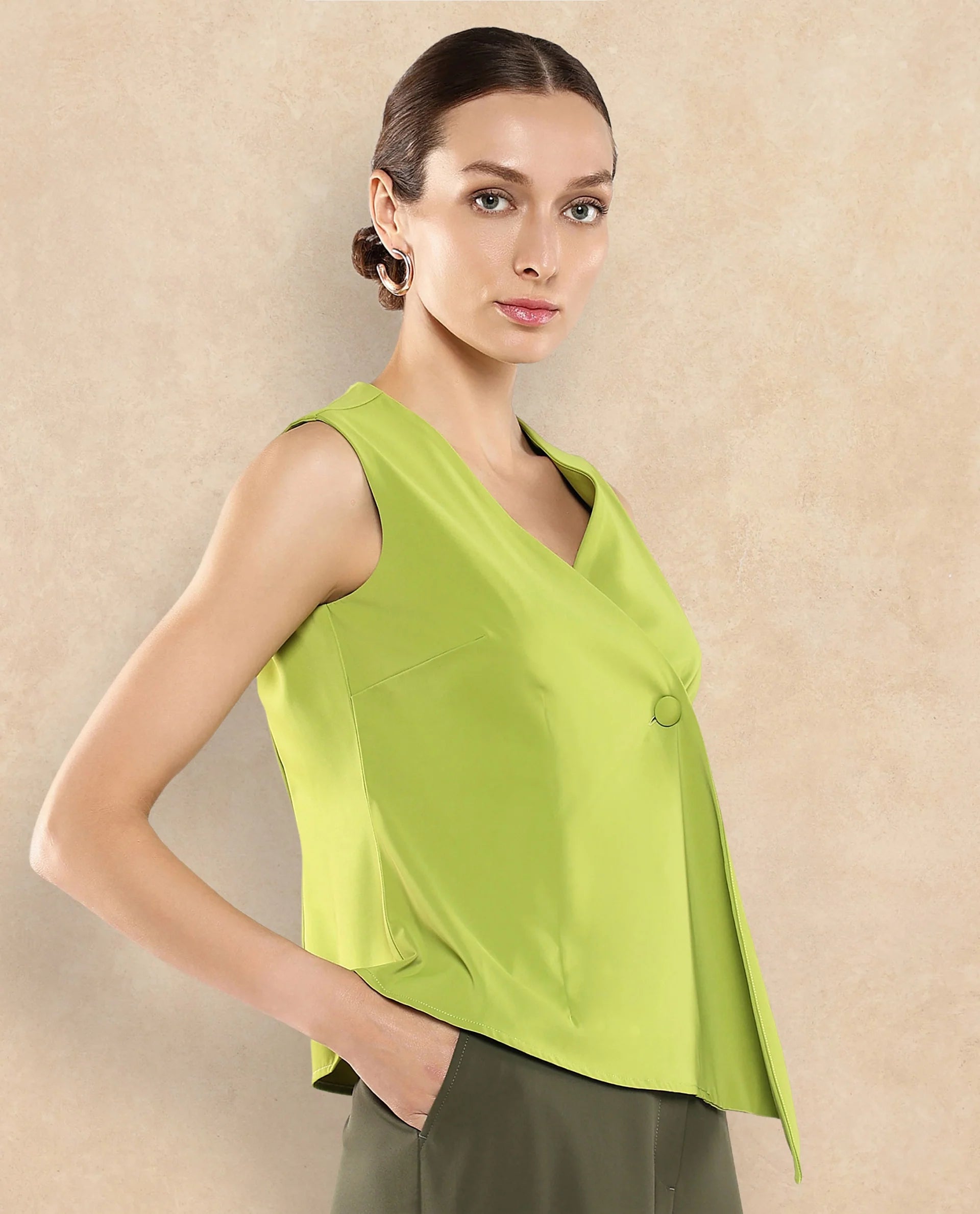 Rareism Women Tuika Flouroscent Green Satin Sleeveless Over Lap Neck Button Closure Plain Top