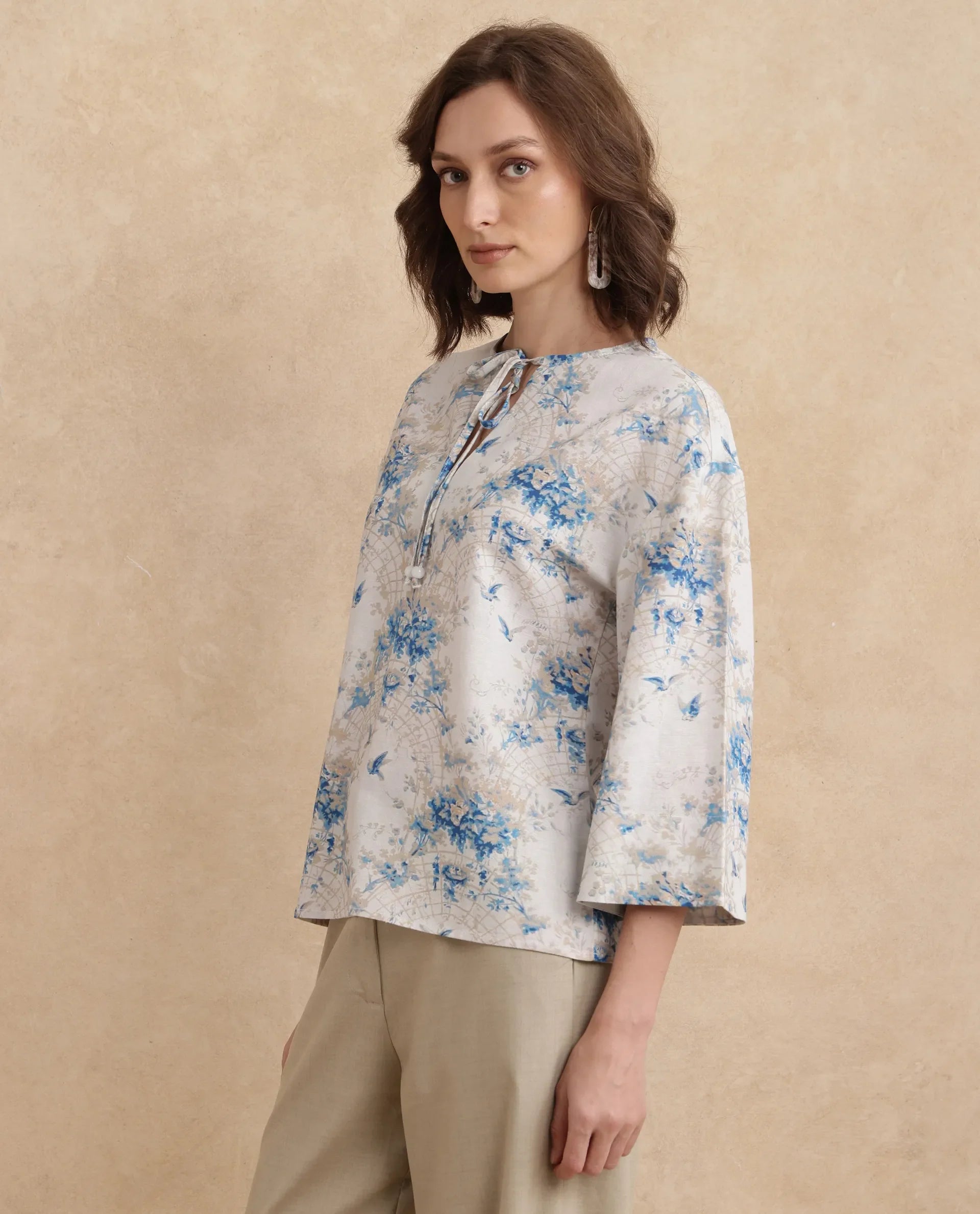 Rareism Women Wemiso Dusky Blue Bell Seeves Tie Up Neck Regular Fit Floral Print Top