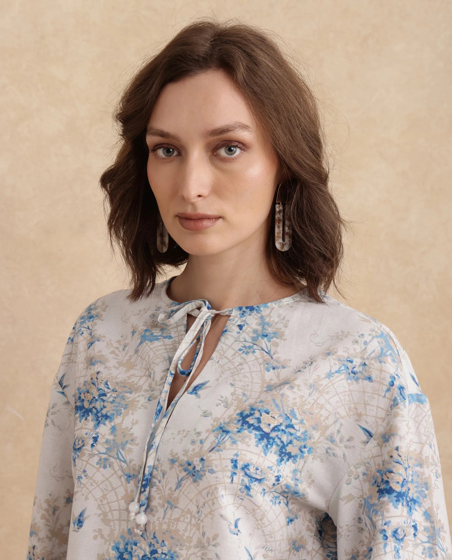 Rareism Women Wemiso Dusky Blue Bell Seeves Tie Up Neck Regular Fit Floral Print Top