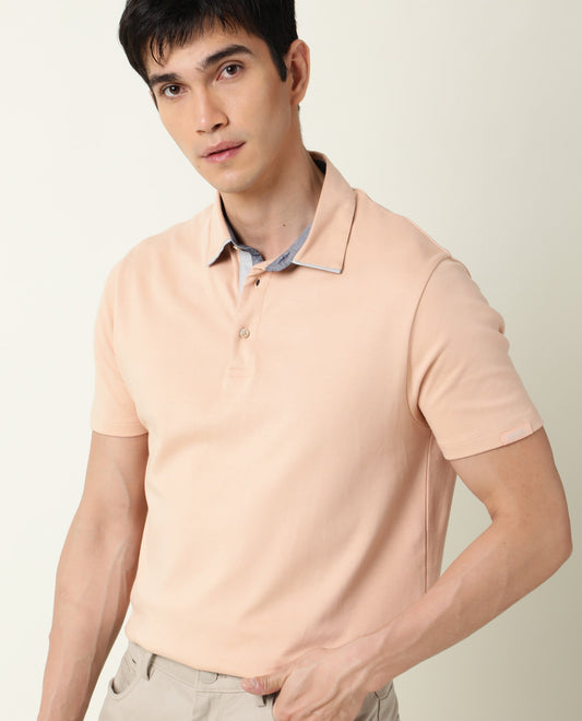 Rare Rabbit Men's Zap Peach Solid Cotton Fabric Collared Neck Half Sleeve Polo T-Shirt